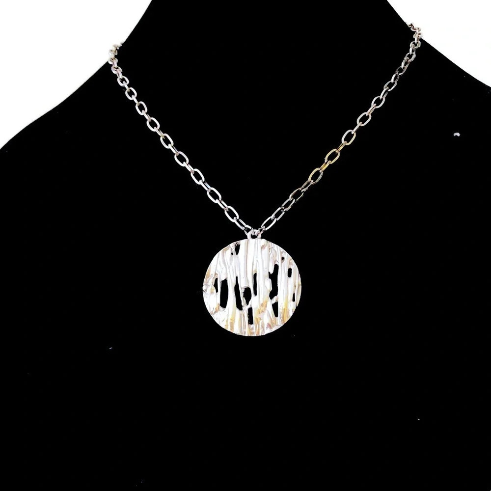 Trifari medallion necklace. Silver plated.